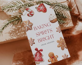 May include: White gift tag with red and brown gingerbread cookies, candy canes, and a Christmas tree. The text reads "Baking Spirits Bright" and "From Amanda".