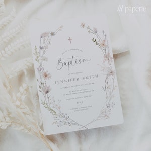 May include: A white baptism invitation with a watercolor floral wreath and a cross. The text reads "Join us to celebrate the Baptism of our daughter Jennifer Smith, Saturday, October 8th at 2:00 PM, St. Michael's Church, 14 North Street, Santa Monica, CA, Lunch to follow at Cafe Blue, RSVP to Sarah by August 15th at 123-456-788".