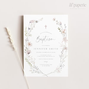May include: A white baptism invitation with a watercolor floral wreath in shades of pink, blue, and green. The text reads "Join us to celebrate the Baptism of our daughter Jennifer Smith, Saturday, October 5th at 2:00 PM, St. Michael's Church, 14 North Street, Santa Monica, CA, Lunch to follow at Cafe Blue, RSVP to Sarah by August 15th at 123-456-789".
