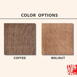 May include: Image displaying two wood grain samples labeled "Coffee" and "Walnut" under the heading "COLOR OPTIONS." The "Coffee" sample is a dark brown, while the "Walnut" sample is a lighter brown. The logo "THE ART OF ENGRAVING" is in the bottom right.