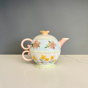 Vintage Avon Stacked Teapot and Cup for one, hand painted in beautiful colors.  Teapot on the top and your beautiful cup on the bottom.