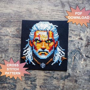 May include: Cross stitch pattern featuring a detailed portrait of a character with white hair, a stern expression, and yellow eyes. The design is on a black background, with text that says "PDF DOWNLOAD" and "CROSS STITCH PATTERN".