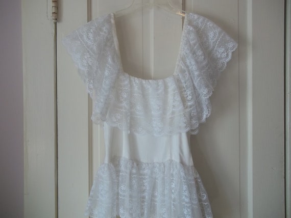 Whimsical Elegance: Lacy White Ruffled Dress for … - image 2