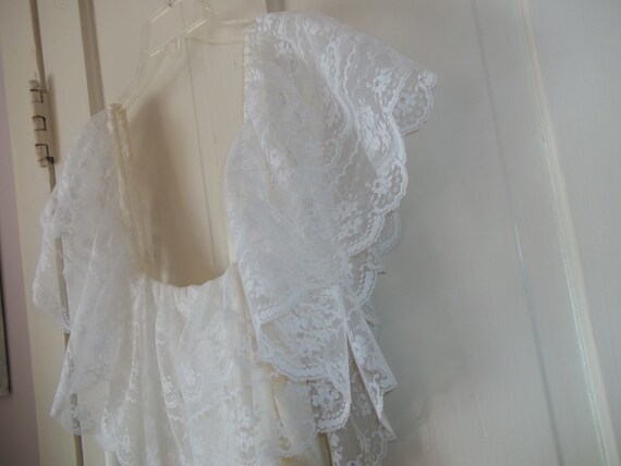 Whimsical Elegance: Lacy White Ruffled Dress for … - image 4