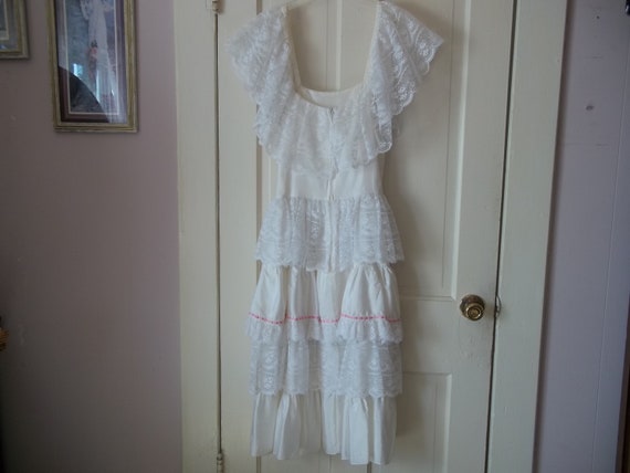 Whimsical Elegance: Lacy White Ruffled Dress for … - image 5