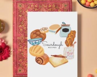May include: A white card with a circle of illustrated sourdough bread, rolls, and a bowl of dough. The text "Sourdough Recipes" is in the center of the circle.