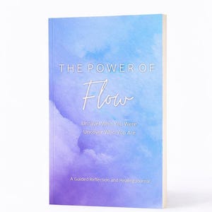 May include: A softcover journal with a blue and purple watercolor gradient cover. The text reads: THE POWER OF Flow, Unravel Who You Were, Uncover Who You Are, A Guided Reflection and Healing Journal. The book is standing upright.
