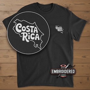 May include: A rustic wooden sign with the text "Welcome to our home" in white lettering. The sign features a distressed finish and a simple, inviting design, perfect for entryway decor.