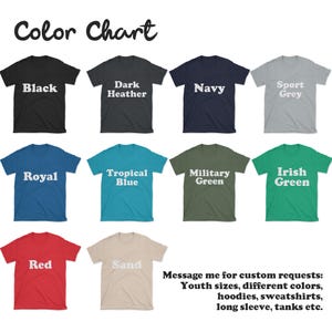 May include: Color chart showing various t-shirt colors, including black, dark heather, navy, sport grey, royal, tropical blue, military green, irish green, red, and sand. Text on the image says "Message me for custom requests: Youth sizes, different colors, hoodies, sweatshirts, long sleeve, tanks etc."