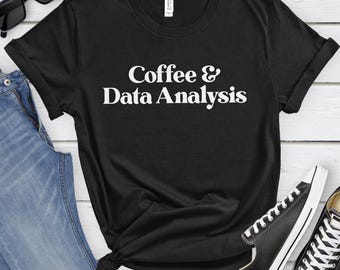 May include: Black t-shirt with white text that reads "Coffee & Data Analysis".