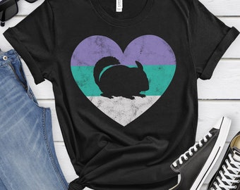 May include: Black t-shirt with a purple, teal, and white heart featuring a silhouette of a chinchilla.