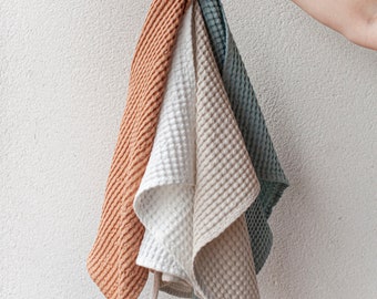 Waffle linen hand towel in Oatmeal. Linen-cotton blend waffle bath towel. Absorbent & high quality towel