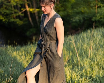 Women's linen dress SALOMĖJA. Classy sleeveless wrap dress. Mid-length linen dress in Dark Green. Vintage inspired linen dress.