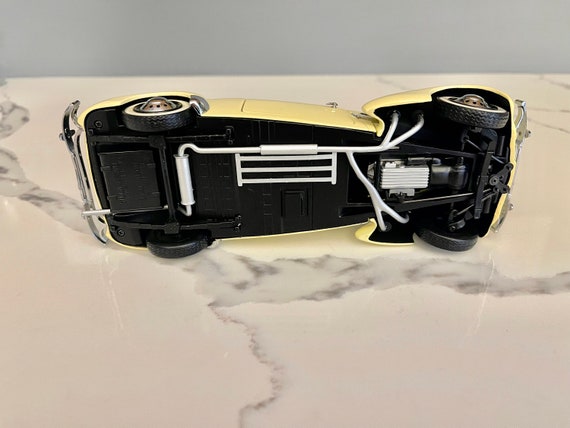 Franklin Phaeton Mint, Vintage 1937 Cord 812 Yellow Phaeton Coupe