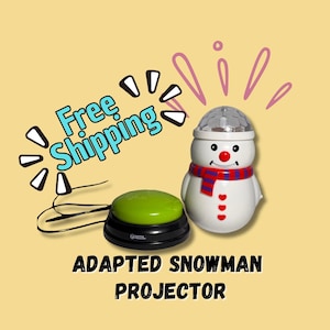 May include: An adapted snowman projector with a green button and a white snowman figure. The snowman has a red and blue scarf, a red nose, and a disco ball head. The text "ADAPTED SNOWMAN PROJECTOR" is below the snowman.