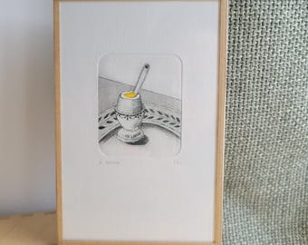 Coquetier avec œuf sur assiette - gravure encadrée