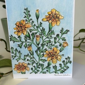 Biglietto d'auguri con acquerello di calendula