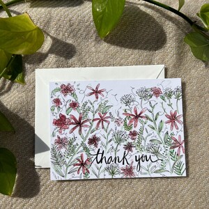 Cartão de agradecimento com impressão em aquarela de flores silvestres