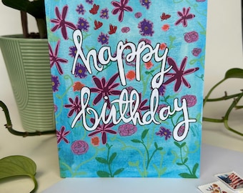 Biglietto di auguri floreale di buon compleanno