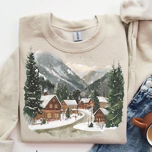 Vintage Christmas North Pole Village Sweatshirt Santa Winter Village In The Mountains Crewneck Boho Holiday Pine Tree Forest And Cabin Shirt