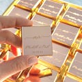 50 Personalized Wedding Chocolate Favors \u2013 Custom Engraved Names & Date \u2013 Milk Chocolate Gift for Guests product logo