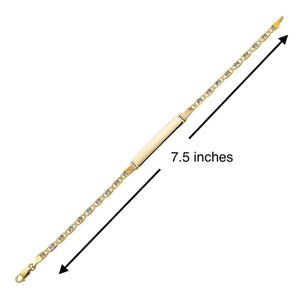 May include: A gold chain bracelet with a rectangular nameplate. The bracelet is 7.5 inches long.