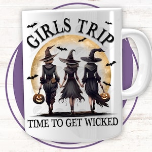May include: White ceramic mug with a black and white illustration of three witches walking under a full moon with bats flying around them. The text "Girls Trip" is above the moon and "Time to Get Wicked" is below the moon.