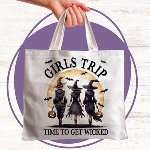 May include: White tote bag with a black and white illustration of three witches walking under a full moon with the text "Girls Trip Time to Get Wicked".