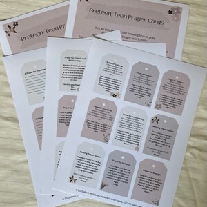 May include: A set of printable prayer cards for preteens and teens. The cards are beige with brown floral accents and feature different prayer topics, such as prayer for friends and relationships, prayer for guidance, and prayer for strength. The cards are designed to help young people learn how to pray and grow in their faith.