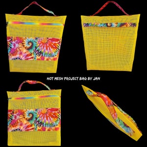 This bright colored Hot Mesh Project Made was sewn a colorful accent divided pocket and luggage strap