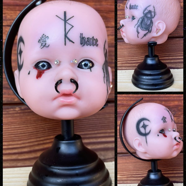 Creepy tattooed doll heads