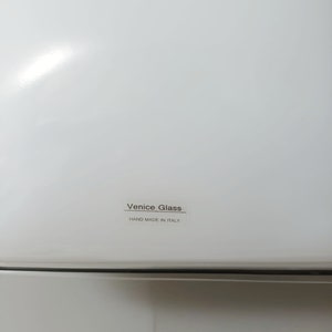 May include: White appliance with a black label that reads "Venice Glass" and "Hand Made in Italy".