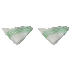 May include: A pair of vintage wall sconces with a white and green glass design. The sconces have a triangular shape and a layered glass design.