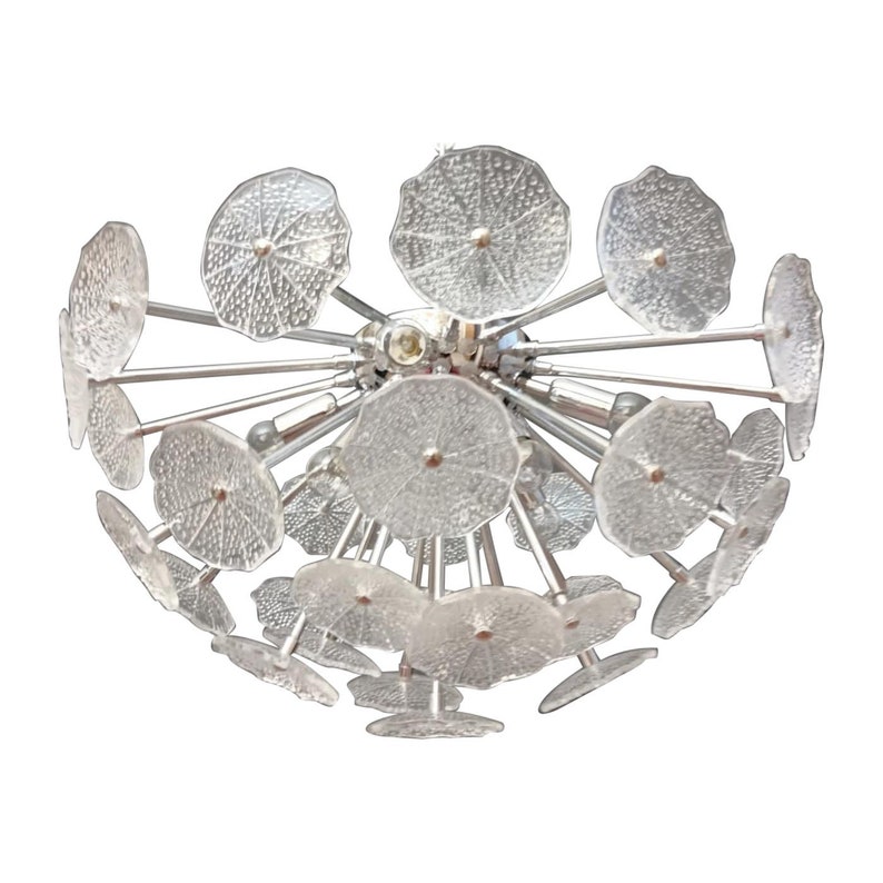 May include: A silver ceiling light fixture with multiple clear glass flower-shaped shades.