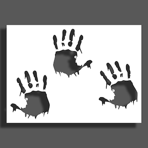 Puede incluir: Tres huellas de manos negras sobre un fondo blanco. Las huellas de manos están goteando pintura negra.