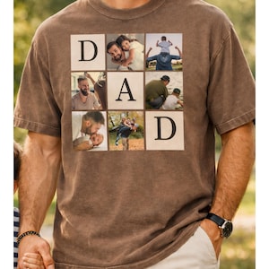 May include: Brown t-shirt with the word "DAD" in large, block letters. Each letter is a square containing a family photo. The shirt is short-sleeved and has a relaxed fit.