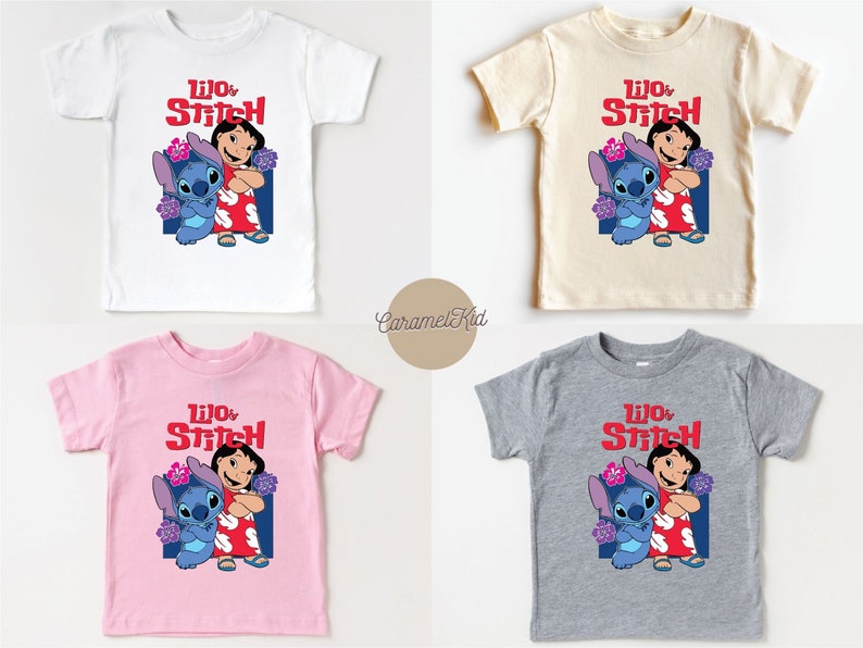 May include: Four different colored t-shirts featuring a cartoon image of Lilo and Stitch from the Disney movie Lilo & Stitch. The shirts are white, beige, pink, and gray.