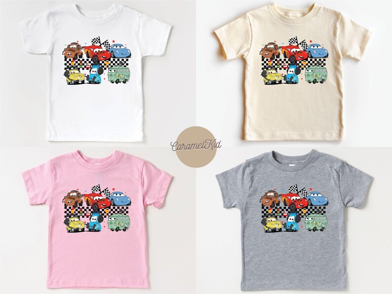 May include: Four different colored t-shirts featuring a cartoon image of a group of cars from the Cars movie. The cars are on a checkered flag background. The t-shirts are white, beige, pink, and gray.