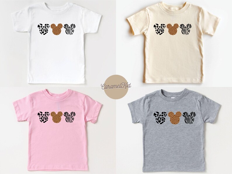 May include: Four toddler-sized t-shirts in different colors with a print of three Mickey Mouse heads in different animal prints. The prints are leopard, cheetah, and zebra.