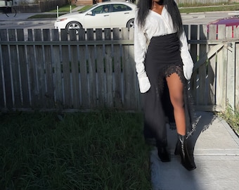 Baggie Tee asymmetrical Dress  , long exaggerated sleeves and  lace trim . Black and white dress , long sleeve