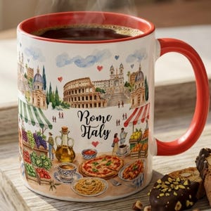 May include: A white ceramic mug with a red interior and handle, featuring a colorful illustration of Rome, Italy, with the text "Rome Italy." The mug is filled with hot coffee, and sits on a wooden tray with biscotti.