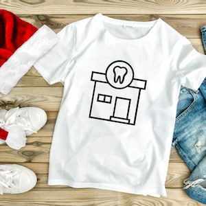 May include: White t-shirt with a black graphic of a dental office building with a tooth in a circle above the door.