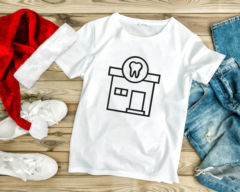 May include: White t-shirt with a black graphic of a dental office building with a tooth in a circle above the door.