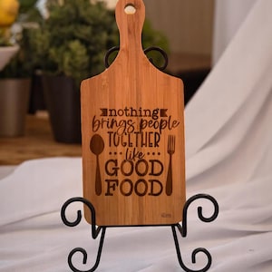 Engraved Bamboo Paddle Board – “Nothing Brings People Together Like Good Food” – 11″×5″ Serving & Cutting Board