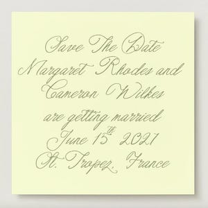 May include: A square pale yellow card featuring dark green cursive text that reads: Save The Date, Margaret Rhodes and Cameron Wilkes are getting married, June 15th 2027, St. Tropez, France. The design is centered on a flat, solid-colored background.