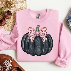 Retro Halloween Black Pumpkin Pink Bow Sweatshirt,Pumpkin Coquette Bow Sweater, Autumn Vibes Shirt, Fall Season Shirt, Halloween Tees
