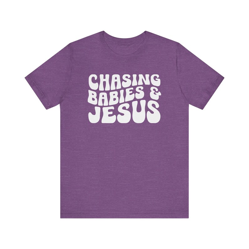 Chasing Babies and Jesus Shirt, Christian Mom Shirt, Christian Mother's Day Shirt, This Mama Prays Shirt, Christianity Shirt, Faith Based Heather Team Purple