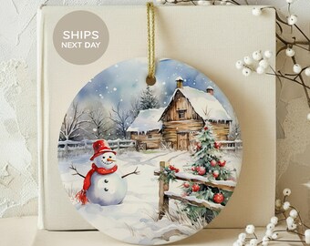 Rustic Snowman Christmas Ornament, Winter Cabin Farmhouse Holiday Tree Decor, Watercolor Cozy Snow Scene Ceramic Keepsake Gift for Family