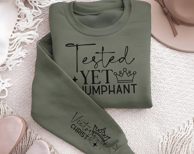 Tested Yet Triumphant Religious Sleeve Print Sweatshirt gift for Women's Christian Sweater Faith Comfort Spiritual Apparel Scriptural