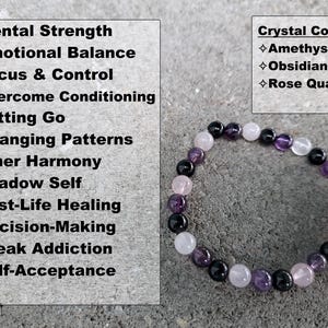 May include: A beaded bracelet featuring amethyst, obsidian, and rose quartz stones. The bracelet is displayed next to text listing benefits such as mental strength, emotional balance, and focus & control. The bracelet is on a gray surface.